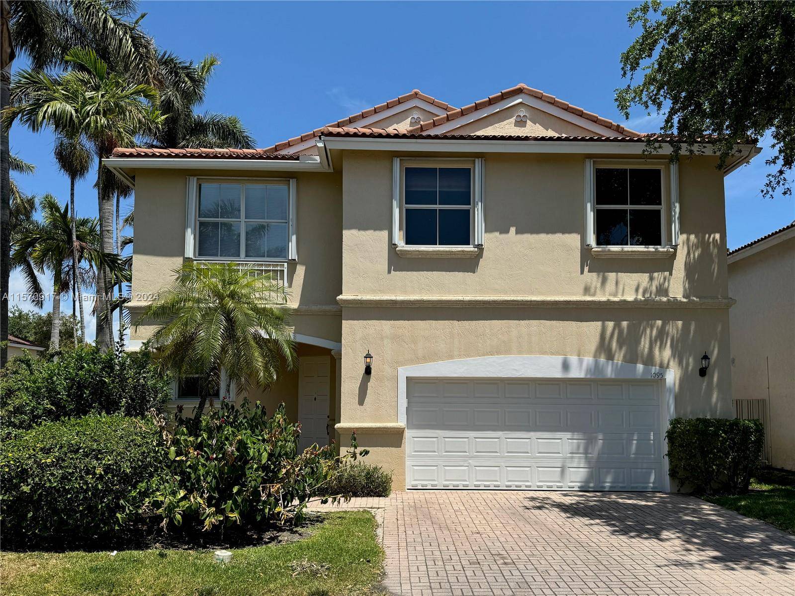 Looking for a large home in a gated community close to the beach ?