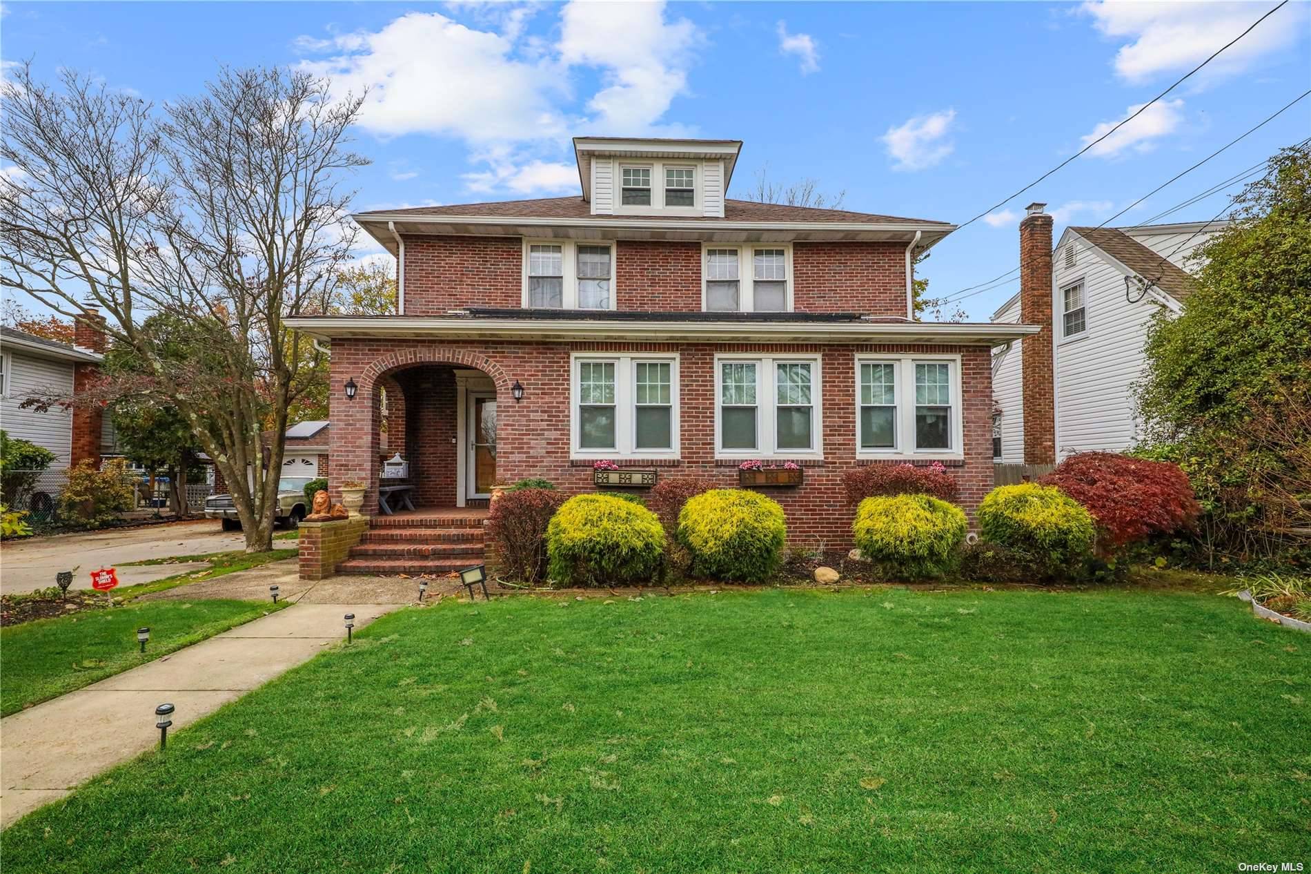 WELCOME HOME TO THIS CHARMING HISTORIC ORIGINAL 1930'S BRICK FARM HOUSE COLONIAL.