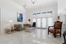 THE ENTRANCE FEATURES 2-1/2' BY 5' WHITE TRAVERTINE TILES