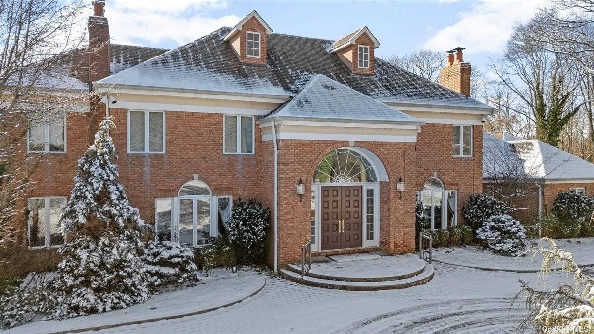 Step into luxury with this stately yet inviting brick colonial, meticulously maintained and offering country club style living on a sprawling property just shy of 5 acres.