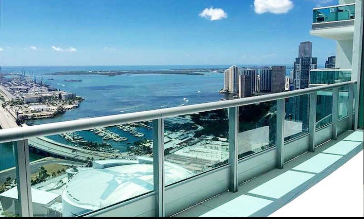 STUNNING BAY AND UNOBSTRUCTED OCEAN BISCAYNE VIEWS, FULLY EXQUISITE FURNISHED 3 3, IN THE CLASSIC AND PRESTIGIOUS 900 BISCAYNE BAY CONDO, PRIVATE FOYER, TWO PRIVATE EXPANSIVE TERRACES, BEAUTIFUL SUNSETS BY ...