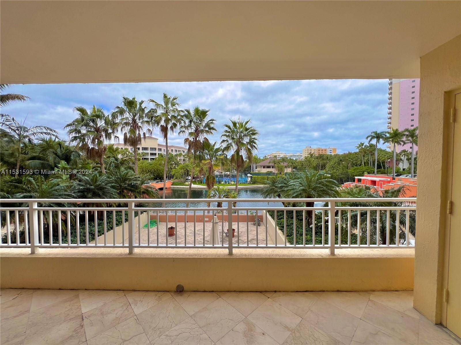 Bright and impeccably remodeled Lake view unit located in Ocean Club at Key Biscayne.