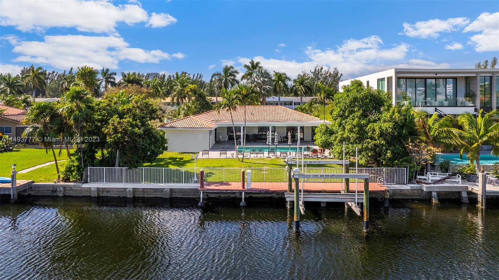 Nestled within the gated waterfront Golden Isles community, this single story waterfront abode boasts 3 bedrooms, 2.