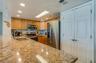 Stainless steel appliances and abundant cabinetry make this kitchen as functional as it is stylish.