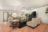 Comfortable living area offering an open layout ideal for relaxing or entertaining guests