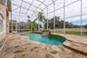 Resort-style heated pool and spa, fully screened for comfort and year-round enjoyment.