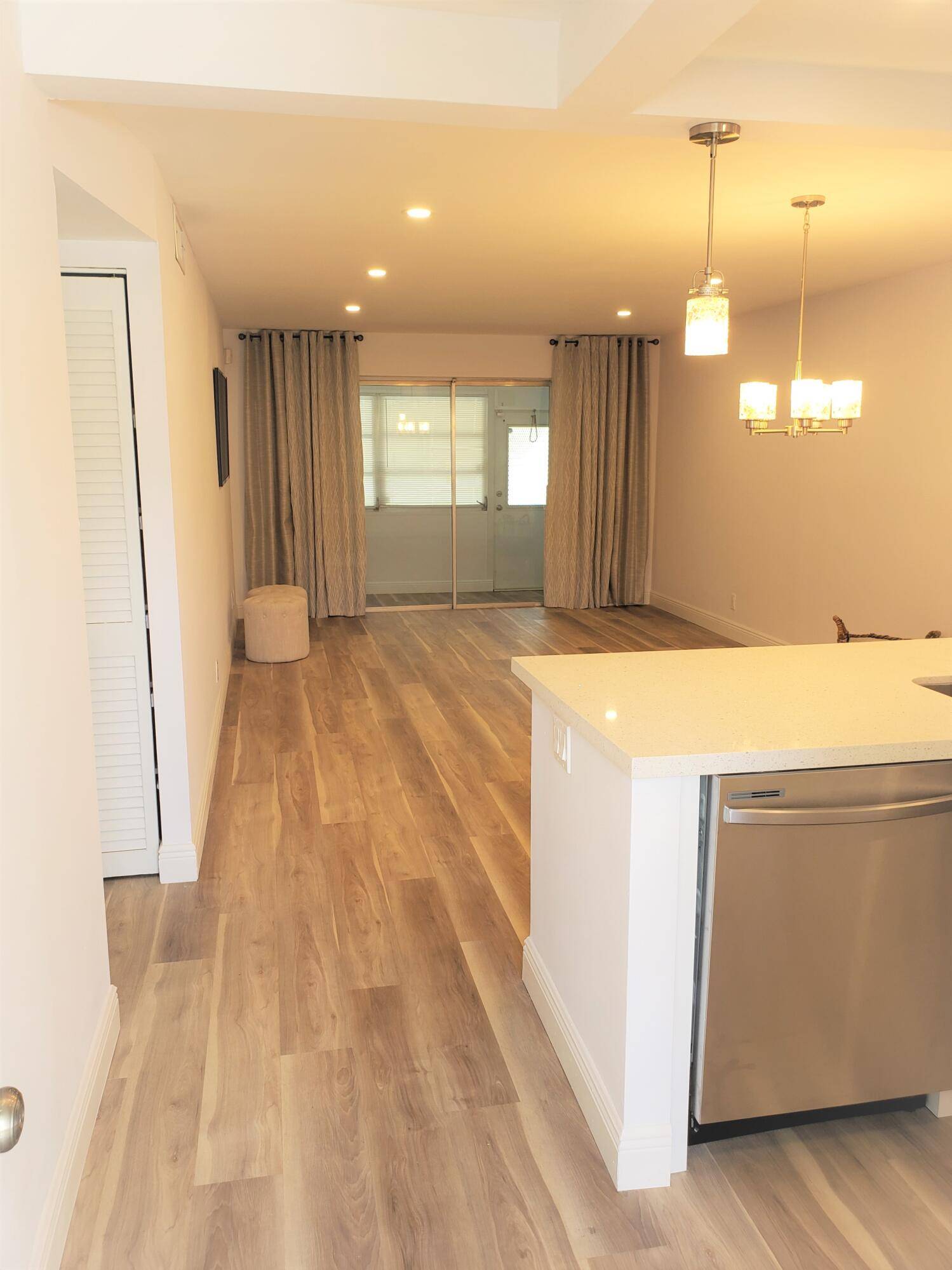 COMPLETELY RENOVATED CONDO WITH IMPACT WINDOWS, JUST A FEW BLOCKS FROM THE BEACH.