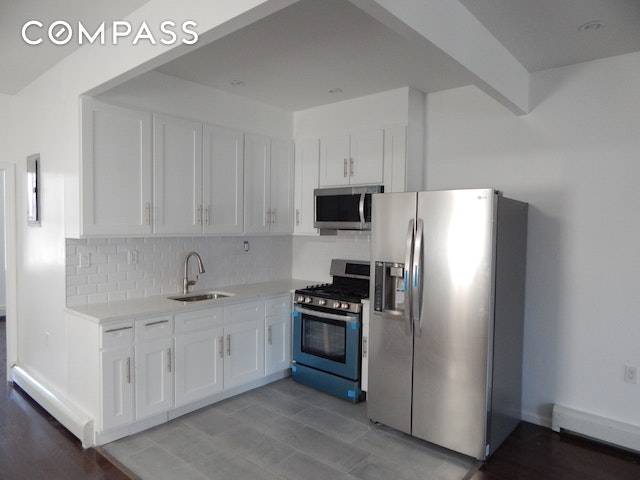 NO Fee Apartment Rental. Luxurious 3 bed 2 bath with skylight, boxed layout and state of the art stainless steel appliances.