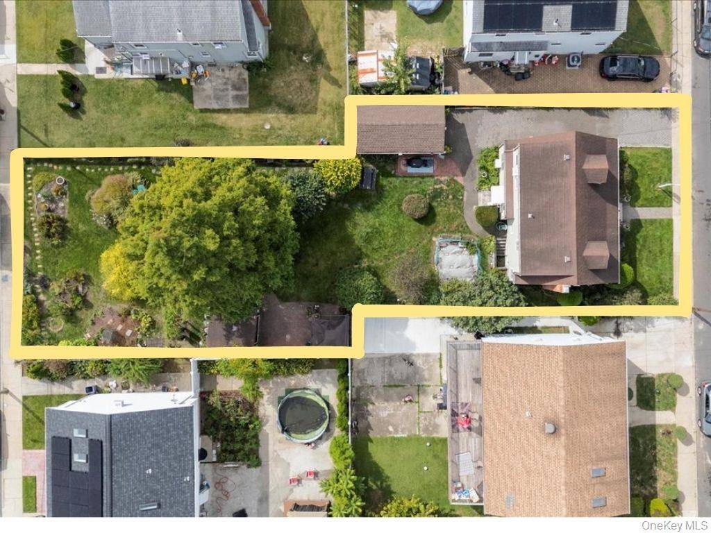 Charming 4 Bedroom, 3 Bath Cape on Oversized Lot with Endless Potential !