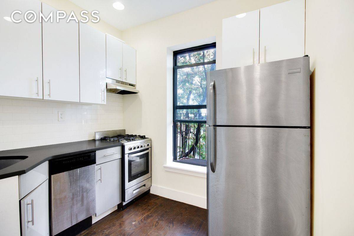AVAILABLE AUGUST 1st ! Stunning 3 bedroom with separate 4th bedroom HOME OFFICE 2 bathroom floor through apartment on a tree lined street in prime Crown Heights !
