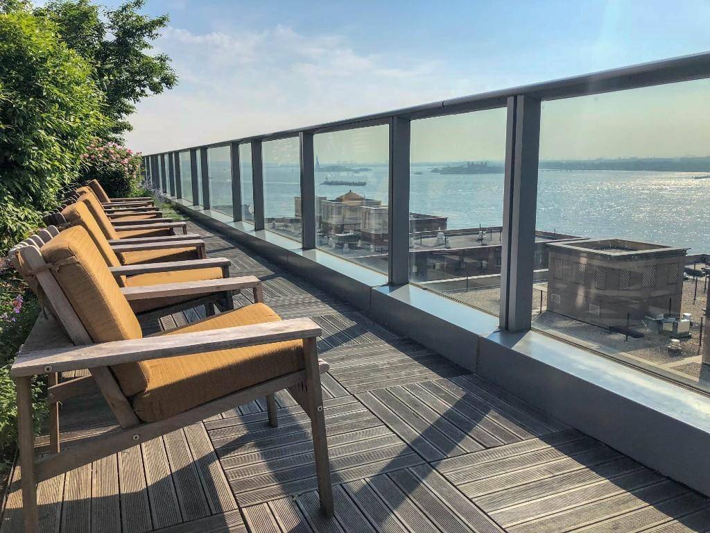 Turn key custom designed 3 bedroom 3 full bath home featuring spectacular views of New York Harbor, Governors Island and beyond.