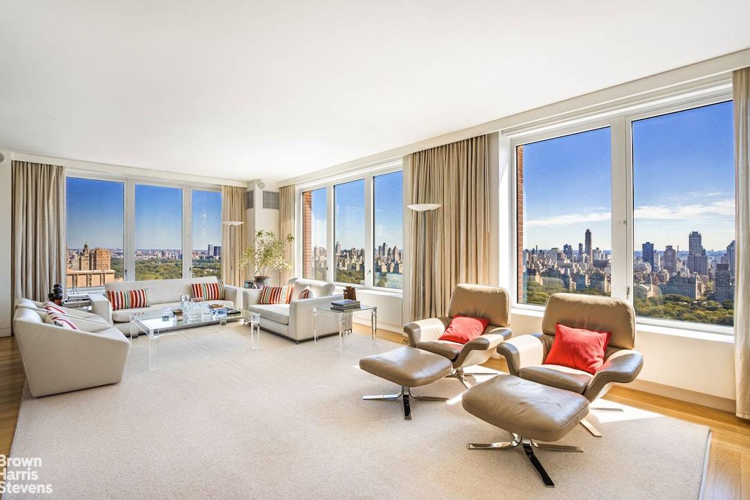 FULL FLOOR CONDO WITH CENTRAL PARK VIEWS Cinematic and show stopping views of Central Park, Manhattan skyline and Hudson River distinguish this private full floor 4 bedroom residence at the ...
