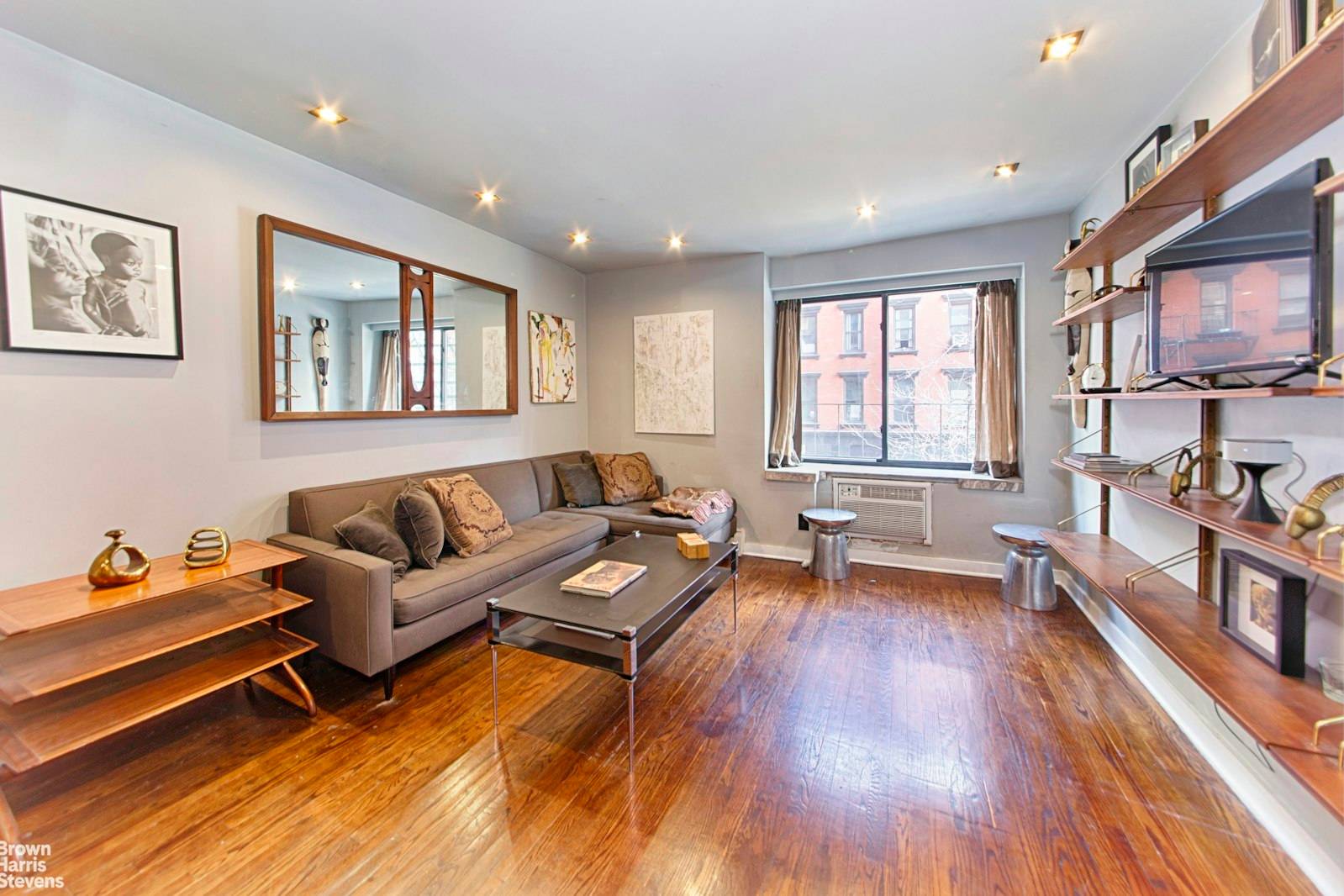This charming and spacious apartment, having been beautifully designed and renovated, sits nestled on a quiet Gramercy street.