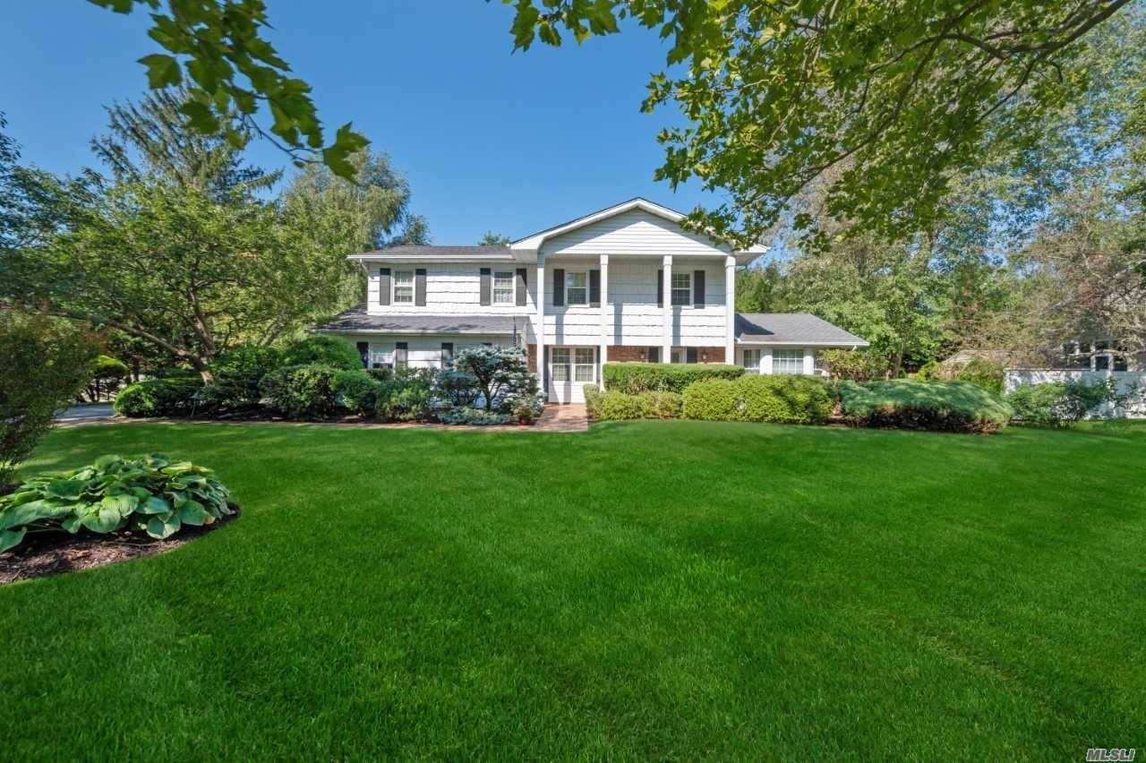 This Perfectly Situated Colonial Is Located In The Famed Commack Schools within the Sought After East Northport Development.
