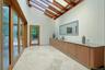 A skylit Butler's Pantry connects the kitchen, dining room and patio, showcasing the home's clean architectural lines and abundant natural light.