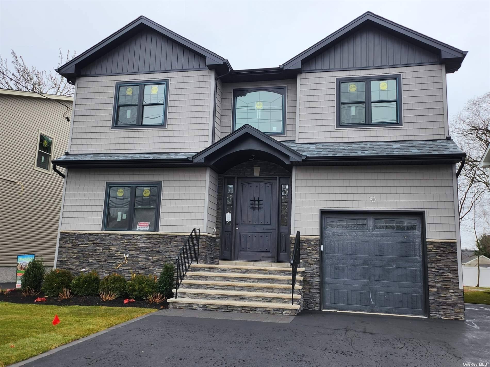 Beautifull New Construction with all the amenities you can think of 3 New Houses each on a large 50 X 150 Lots with 6 cars Parking spaces plus attach garage.