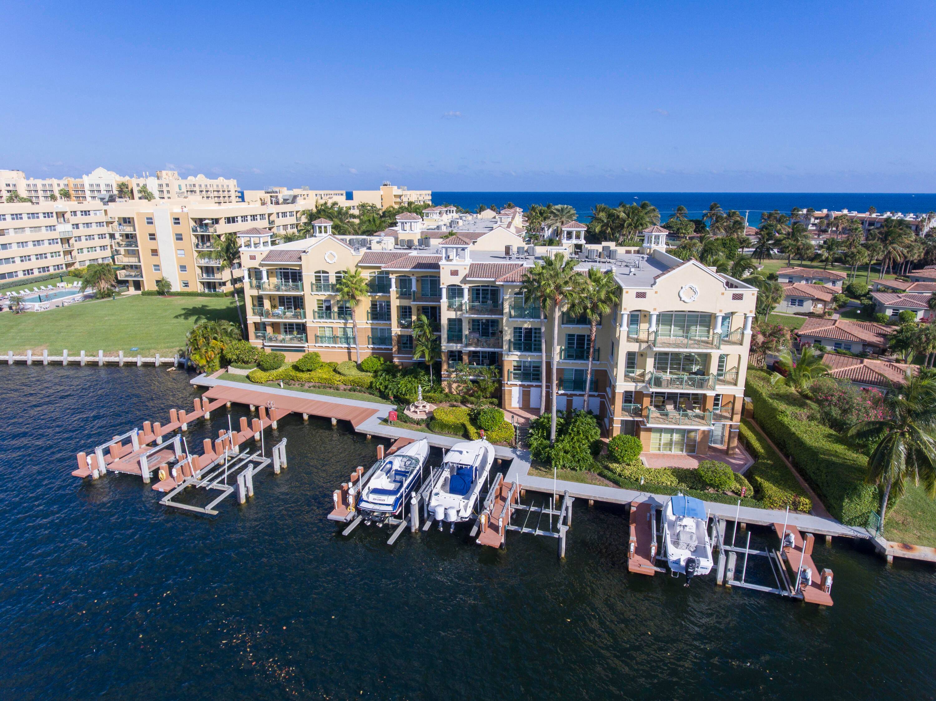 HAVE IT ALL ON THE FAMED HILLSBORO MILE WITH PRIVATE BEACH ACCESS AND A SOUGHT AFTER BOAT DOCK.