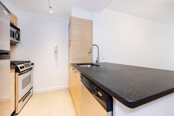 Net Effective Rent. This spacious luxury ONE BEDROOM plus Office dining room features a fully equipped kitchen with concrete counter tops, separate, honed concrete tile floors and full size stainless ...