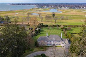 Overlooking the Country Club of Fairfield, Southport Harbor, and Long Island Sound all the way to the Manhattan skyline, this stunning home enjoys one of the most spectacular views in ...