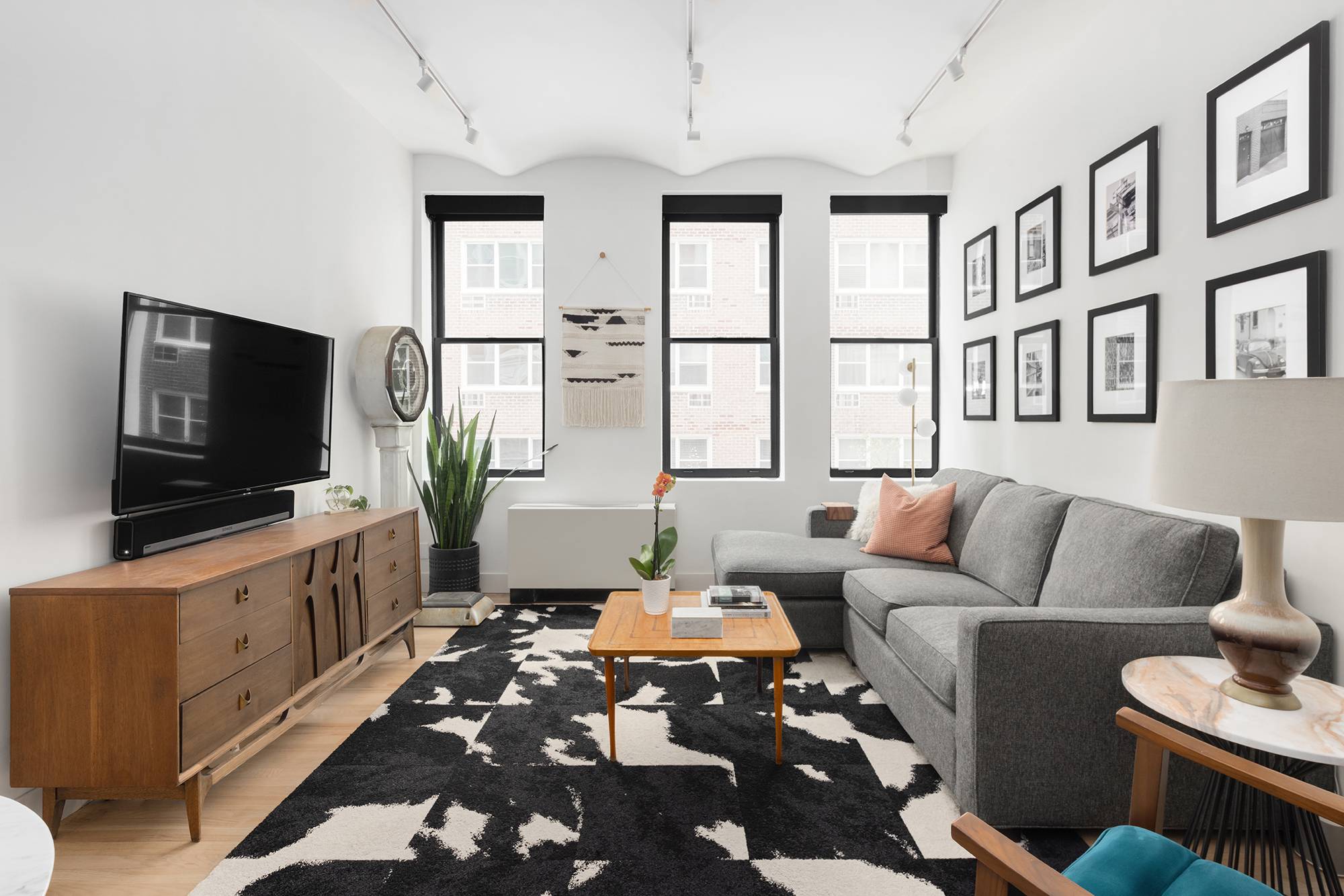 Welcome home to apartment 2D at The Hallanan, a meticulously renovated 2 bedroom located in the coveted West Village.