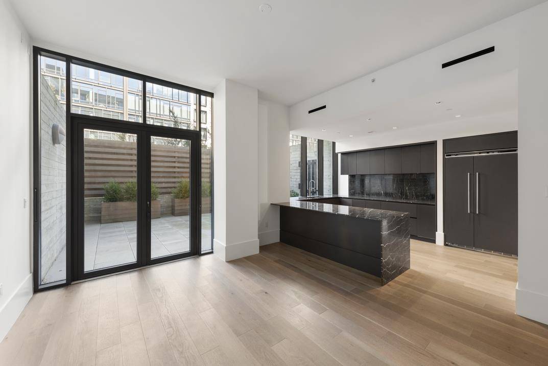A stunning South Williamsburg townhouse with its own private entrance from the street.
