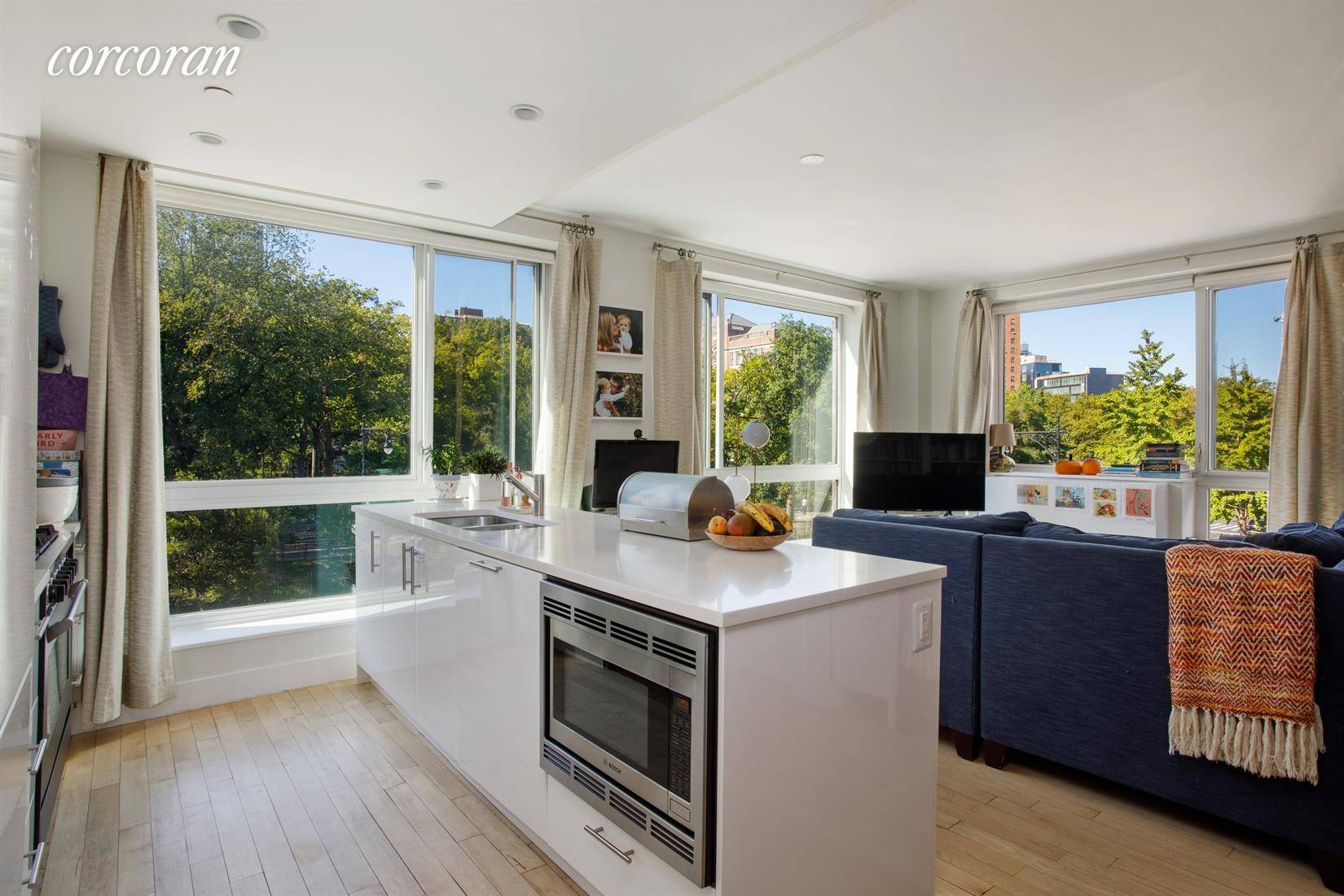 EVERY ROOM WITH A VIEW ! Full park views and sunshine fill this extraordinary home !