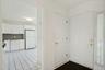 Entrance Foyer with coat closet and white tiled floor