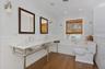 Primary Bathroom w/ European Style Tub, Fixtures, Double Sink w/Towel Bar & Wood flooring,