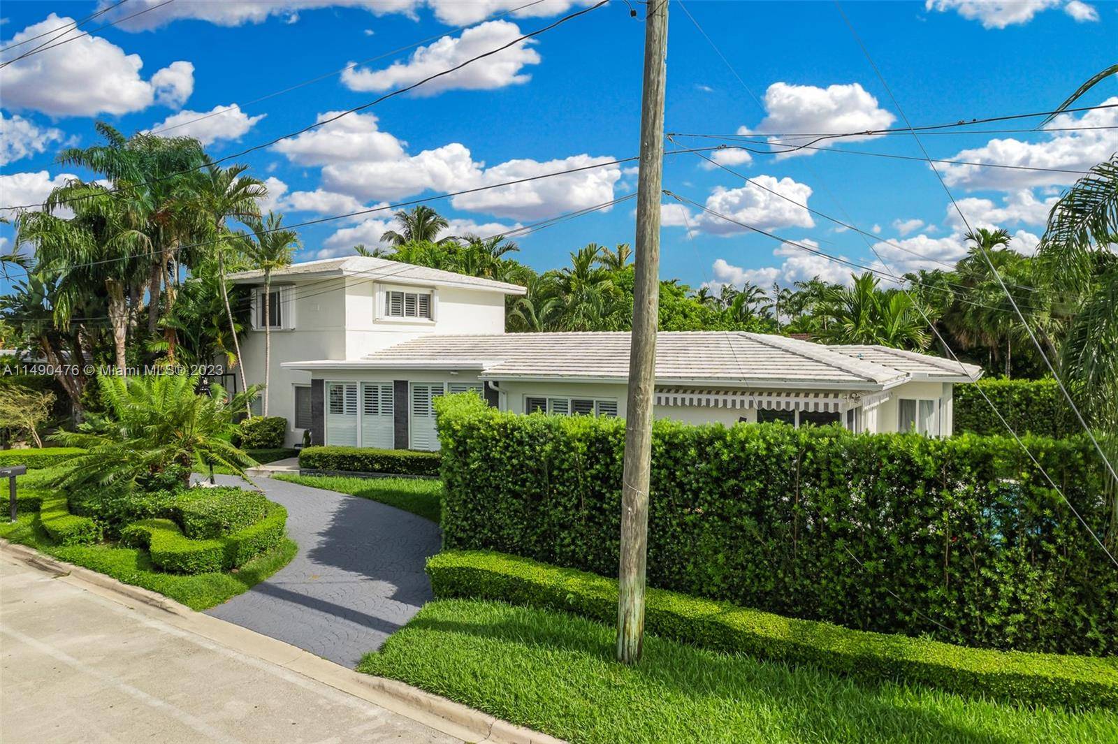 Discover the allure of Surfside living in this prime South Florida home.
