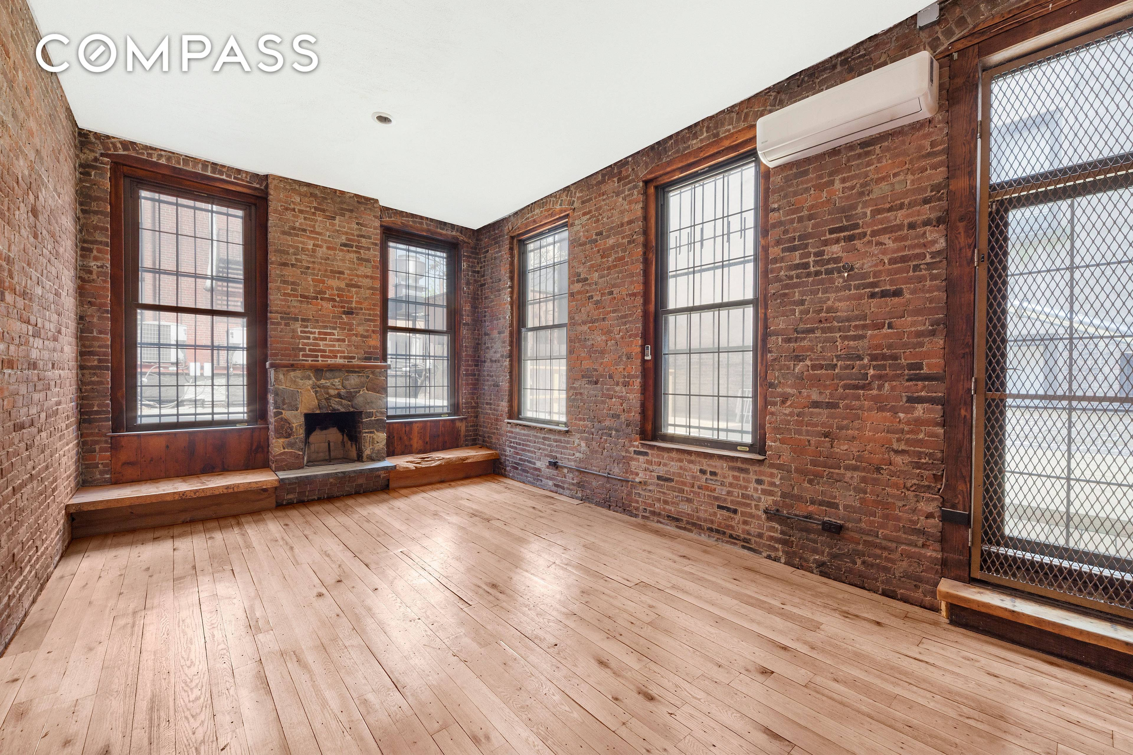HUGE LOFT IN THE HEART OF THE EAST VILLAGE Full floor with a private terrace and fireplace.