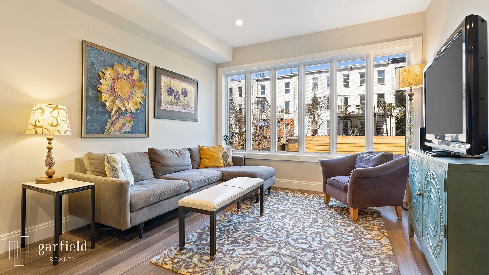 Welcome home to this stunning duplex condo with a zen like private backyard !