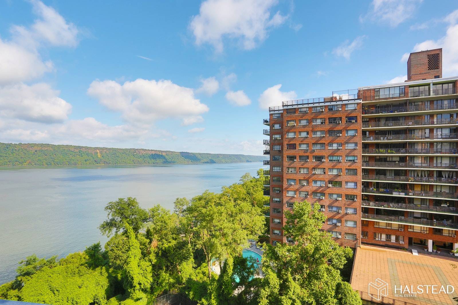 Enjoy dramatic sunsets from the Mid Century River Front Luxury coop River Terrace.