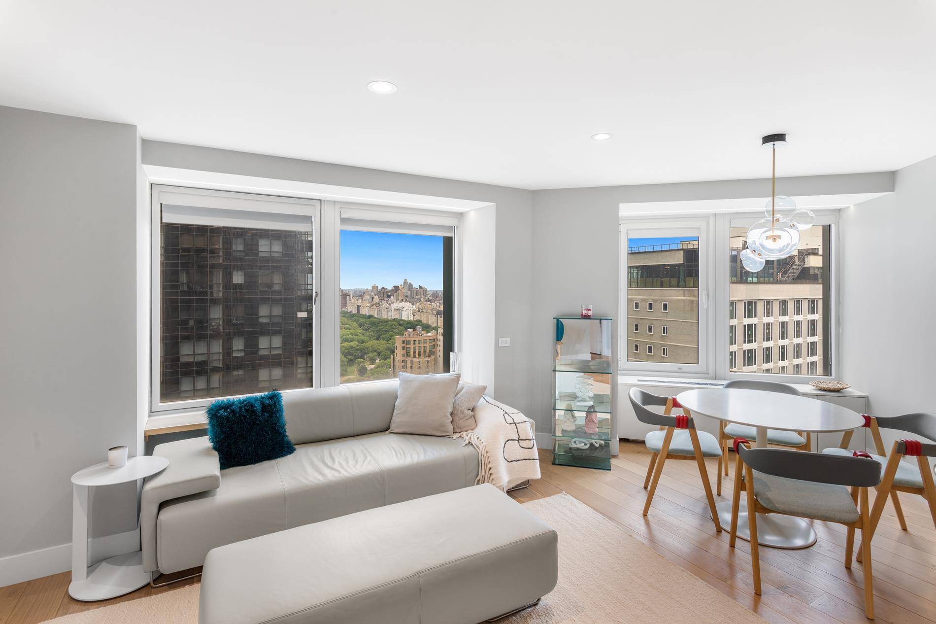 Located in the Cityspire Condominium Building in Central Midtown Manhattan, this gorgeous 2 bedroom and 2.