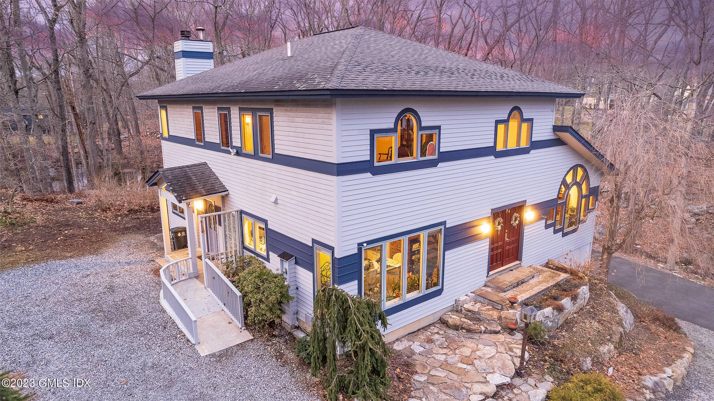 Welcome to this 4 Bedroom Deckhouse Acorn Custom Home in North Stamford w 3 level elevator !