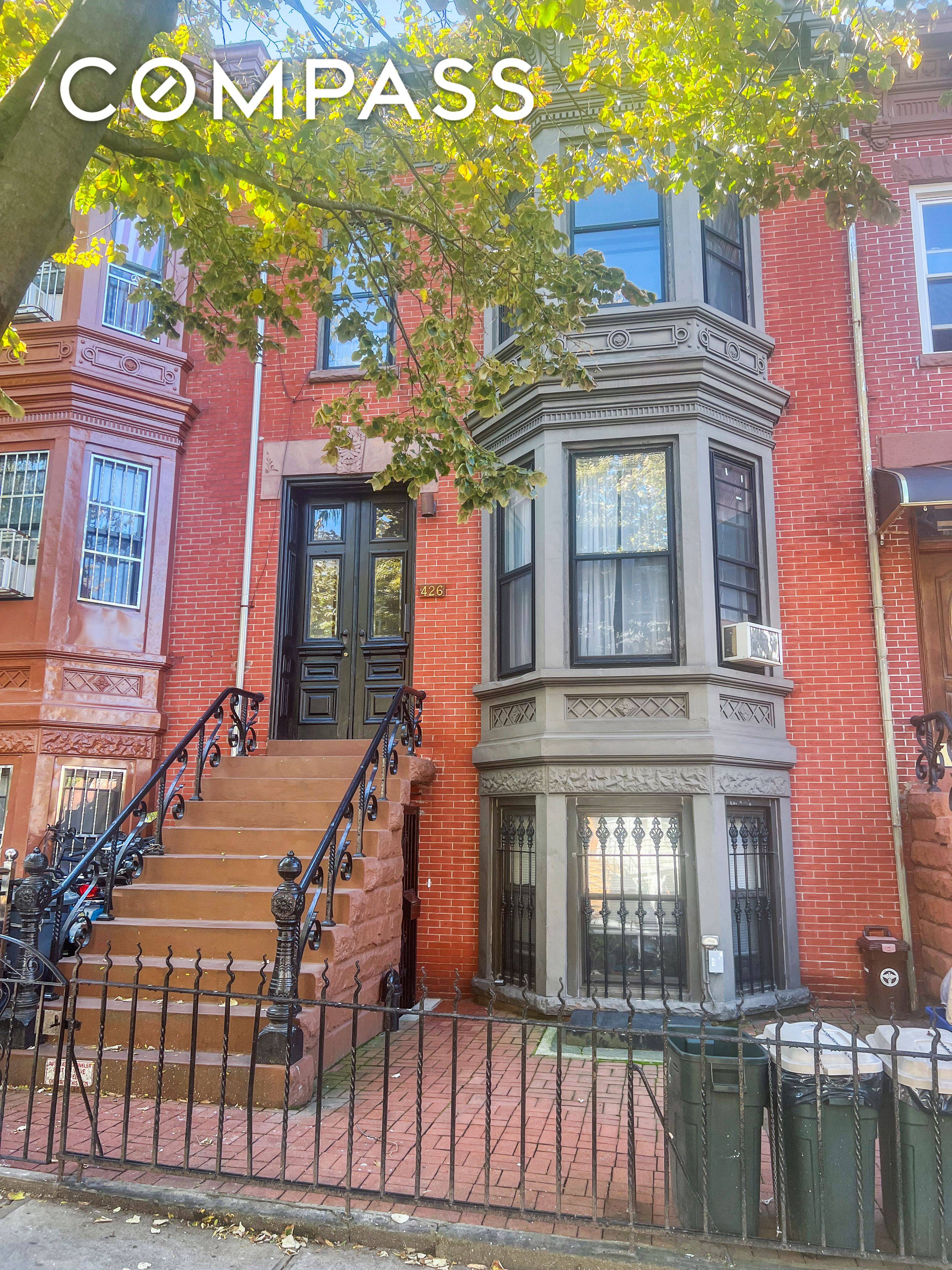 A rare find ! A legal five family federal brick townhouse with four floors of beautiful original details in this well maintained Sunset park home.