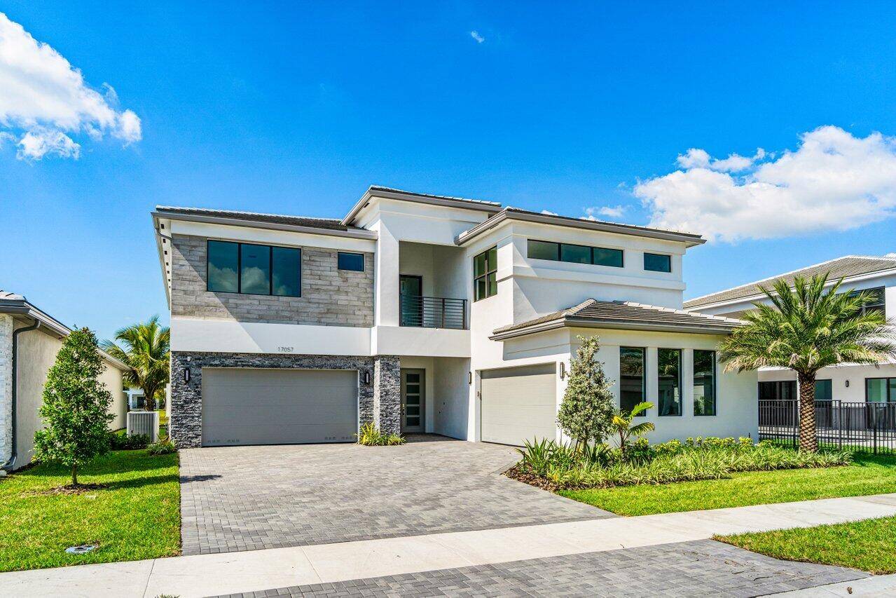 Situated on a lake lot in Boca Raton's highly sought after Lotus community, this brand new never lived in Maldives floor plan offers over 5, 300 SF of living space ...