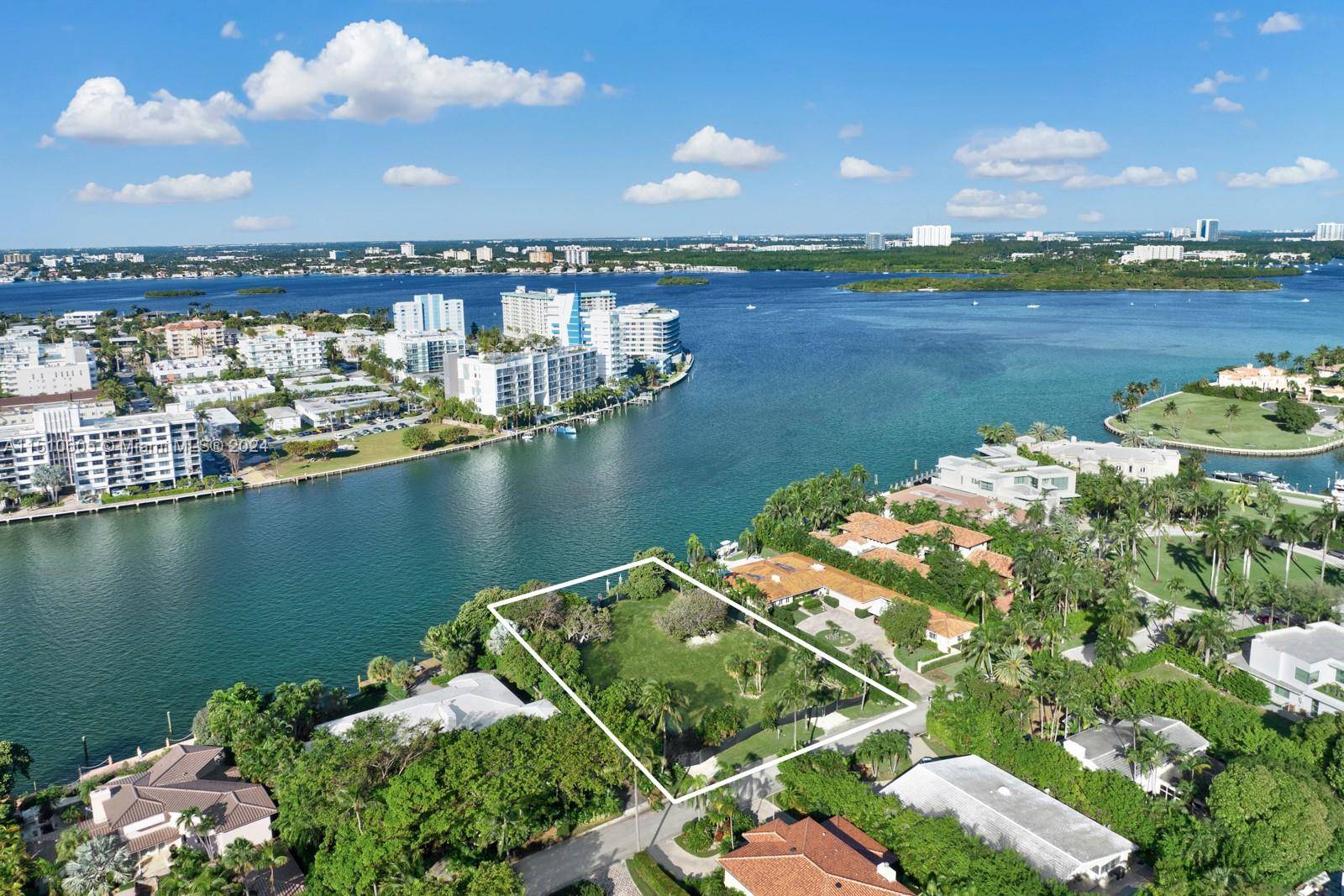 Exceptional waterfront lot located in the guard gated Village of Bal Harbour, one of Miami's most exclusive and secure communities.