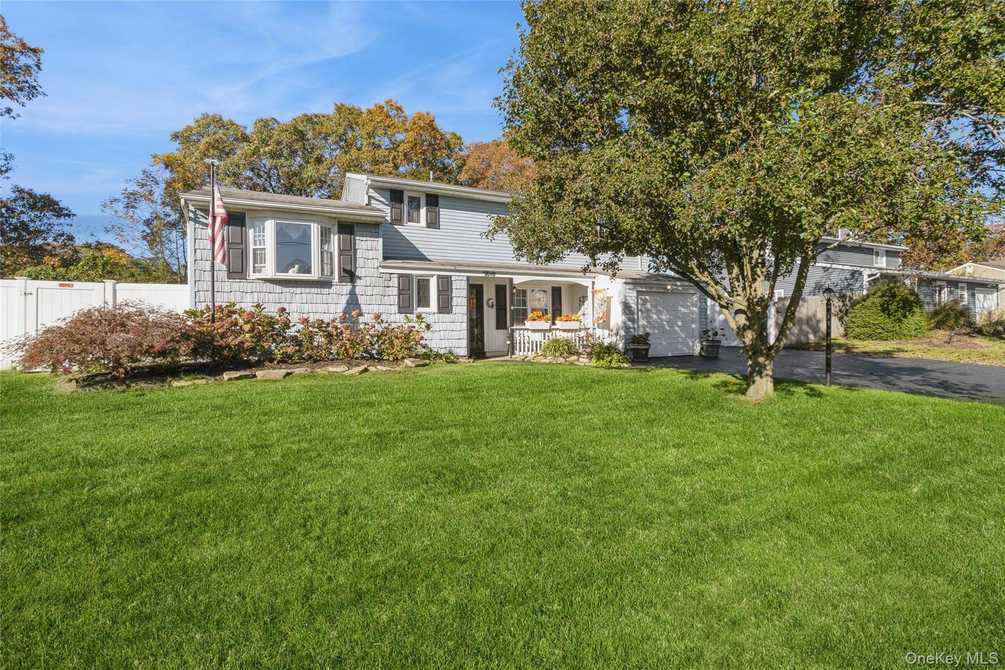 This Beautiful Colonial home features 4 bedrooms, two full baths, spacious living room, 1 car garage, large open eat in kitchen with Quartz countertops, a center Island and a formal ...