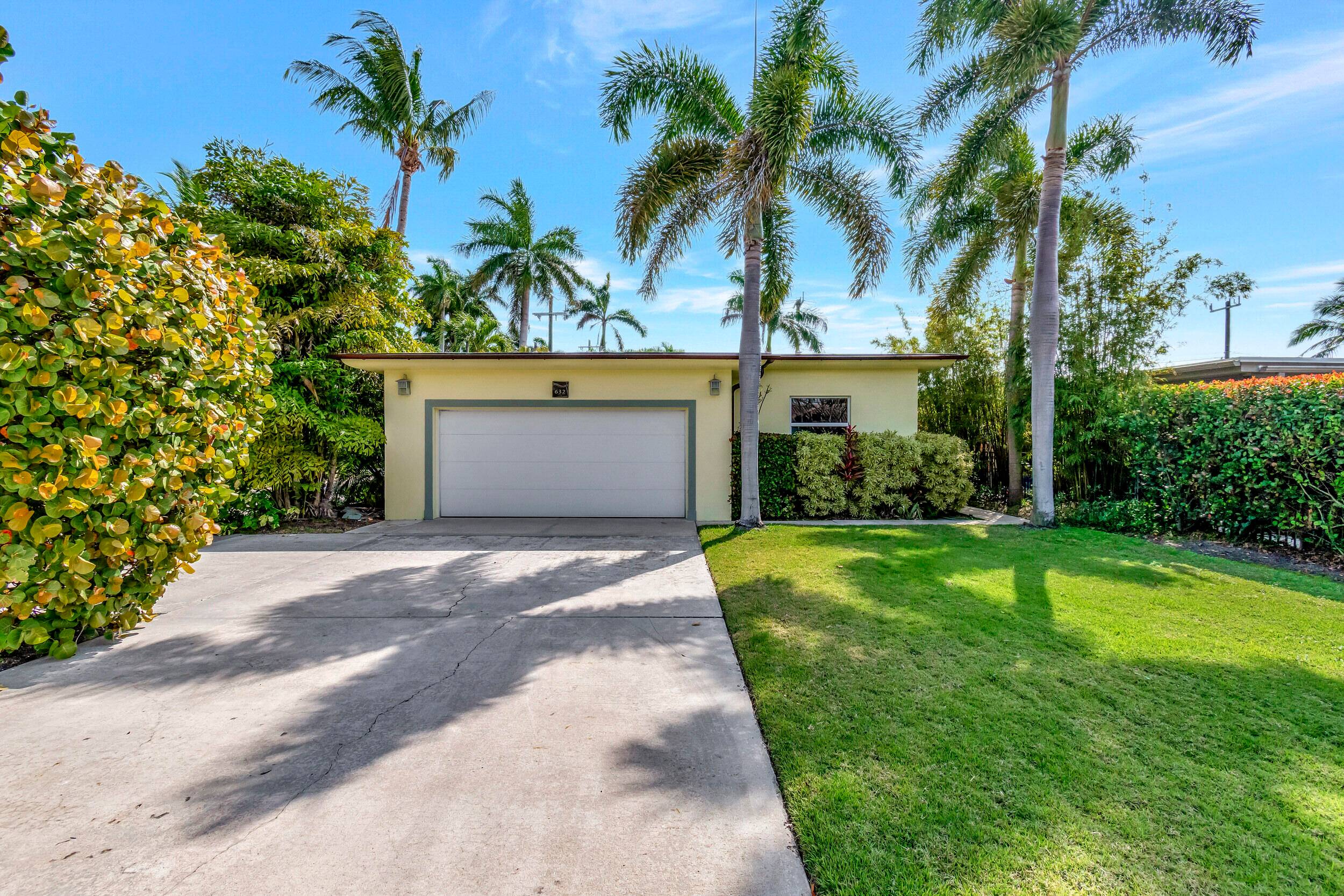 Exceptional Modern Mid Century home situated directly on the Lake Worth Beach Golf Course.