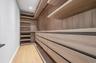 Walk in closet featuring light wood-type flooring