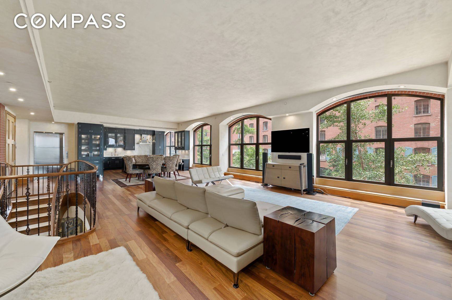 Situated in a prime North Tribeca historic district location, this grand triplex feels like a Soho loft.