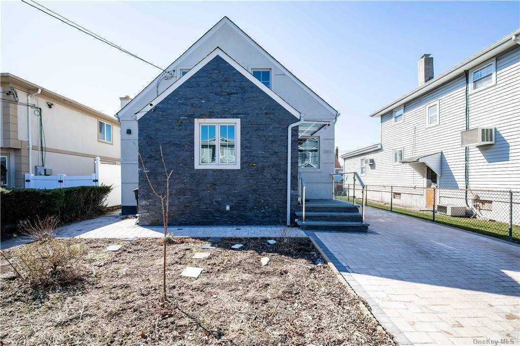 Just recently and completely rebuilt home in the heart of Hewlett, this bright 3 bedrooms, 2 full bathrooms, and a powder room home is ready to move in and enjoy.