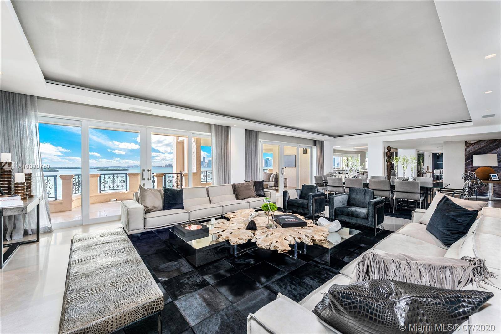Experience Fisher Island living at it's finest in this stunning fully renovated 8th floor Bayview unit.