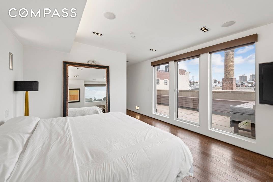 Enjoy privacy and serenity while soaking up the sun in your massive, full floor, gut renovated, pet friendly, Tribeca penthouse triplex, complete with a large terrace and private rooftop in ...