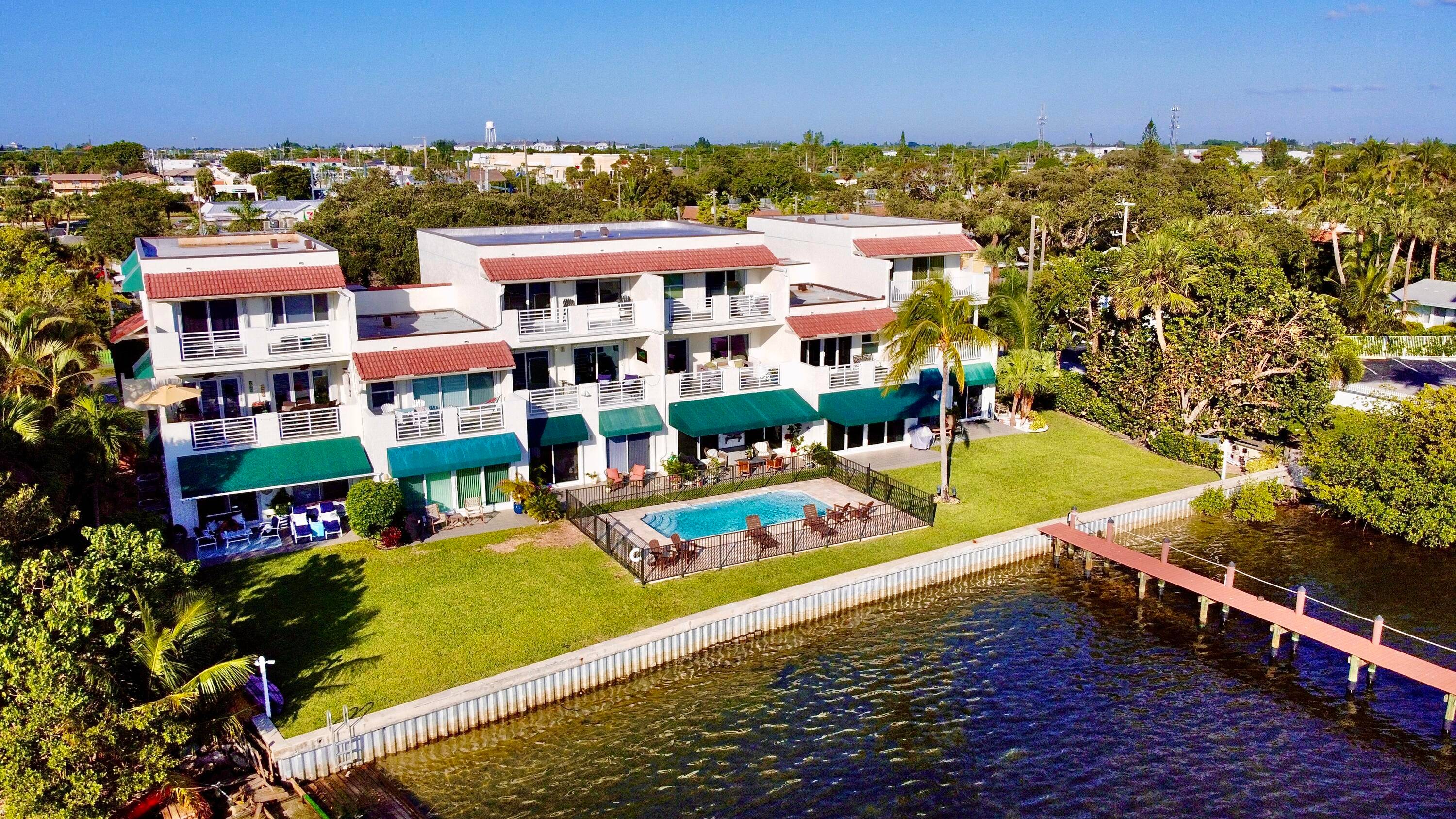 Paradise ! ! Sunrise to sunset in this completely furnished amazing waterfront 2 story townhouse with a BOAT SLIP !