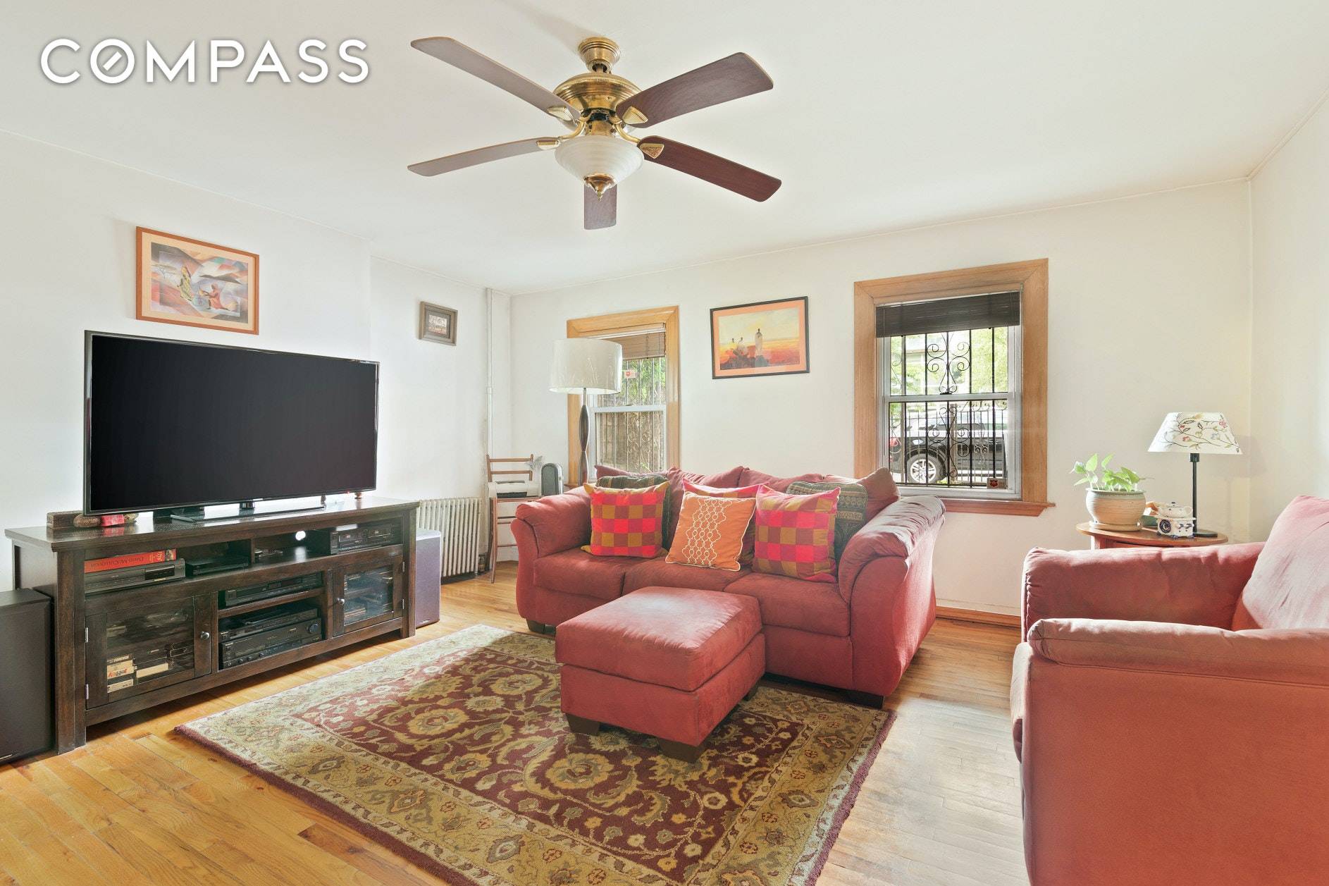 Relax in your private outdoor space in this 25 ft wide two Family home in historic Clinton Hill.