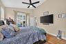 Another view of the Primary bedroom showing the Slider leading out to the lanai