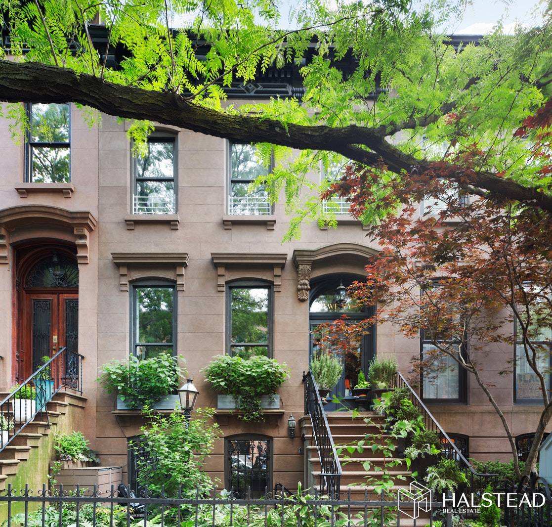 This stunning renovated 20' wide brownstone is located on a gorgeous tree lined block in North Park Slope.