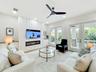Built in fire place with electric fire and additional storage