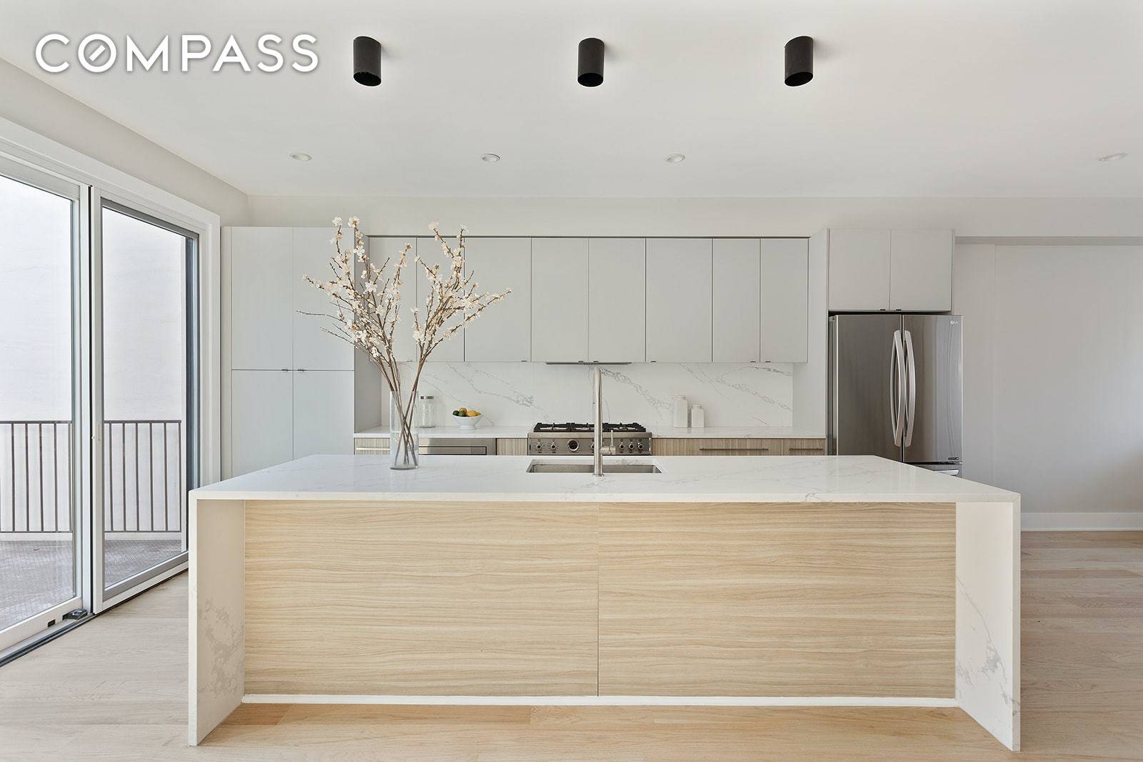 Meticulously renovated two family townhouse featuring exquisitely designed modern interiors.